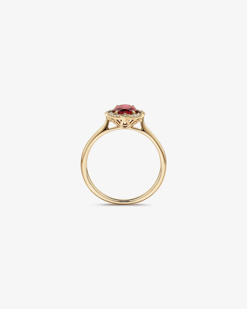 Oval Cut Created Ruby and Diamond Halo Ring in 10kt Yellow Gold