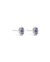 Oval Cut Blue Tanzanite Gemstone and 0.12 Carat TW Diamond Halo Stud Earrings in 10kt White Gold