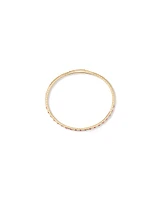 0.35 Carat TW Diamond and Pink Sapphire Gemstone Flex Oval Bangle in 10kt Yellow Gold