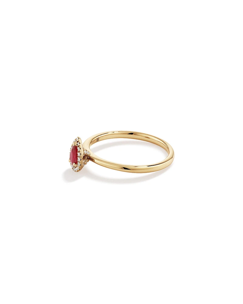 Pear Cut Red Ruby Gemstone and 0.08 Carat TW Diamond Halo Ring in 10kt Yellow Gold