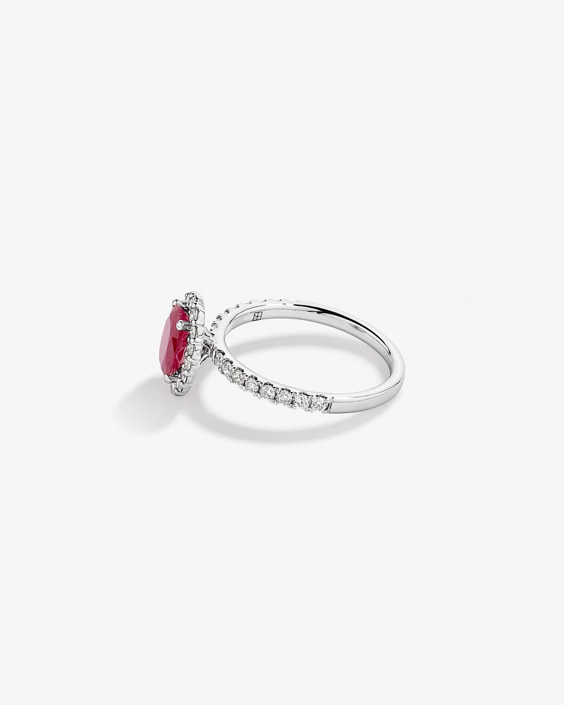 Oval Cut Red Ruby Gemstone and 0.60 Carat TW Diamond Halo Ring in 14kt White Gold