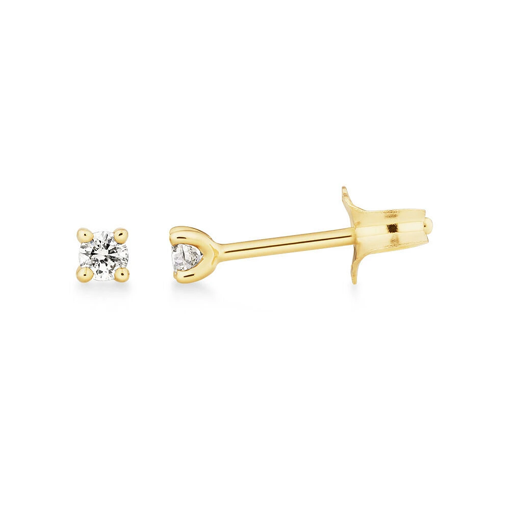 Boutons d'oreilles à solitaire en or jaune 10 K avec diamants totalisant 0,10 ct