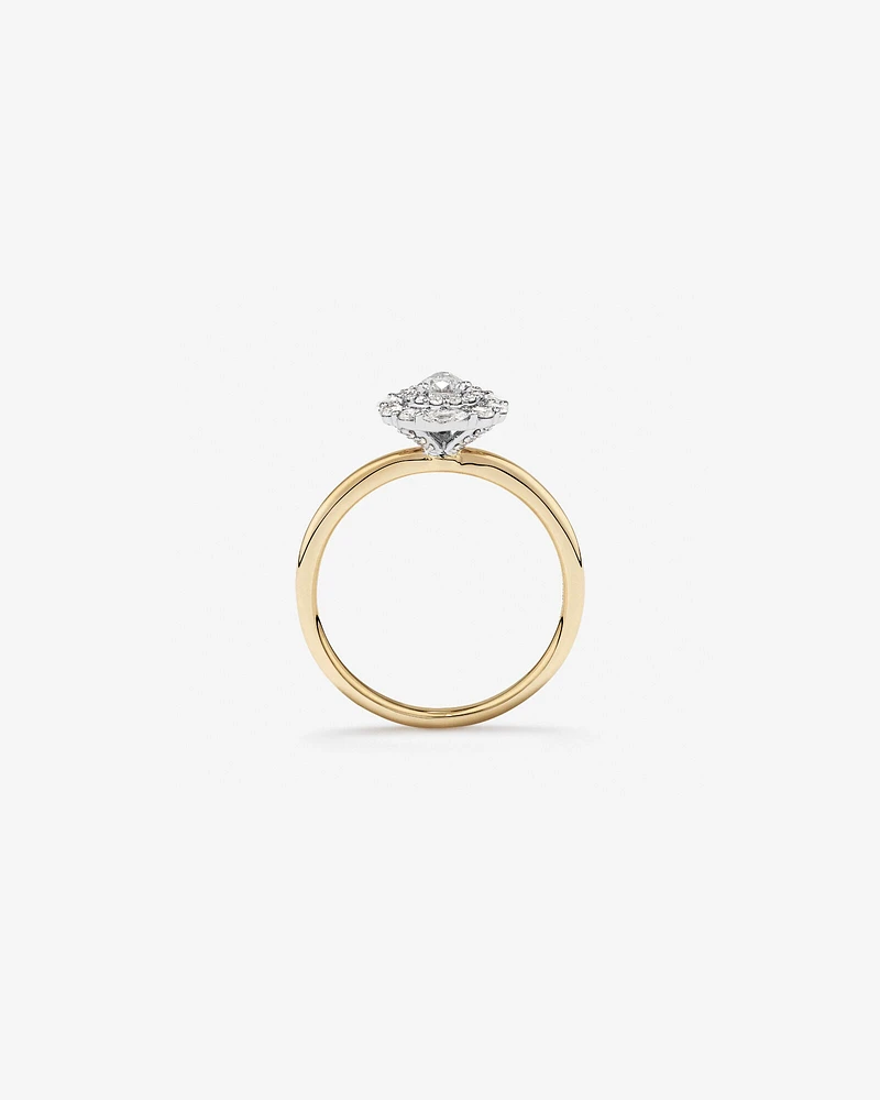 0.67 Carat TW Pear Cut Diamond Marquise and Round Brilliant Halo Engagement Ring in 14kt Yellow and White Gold