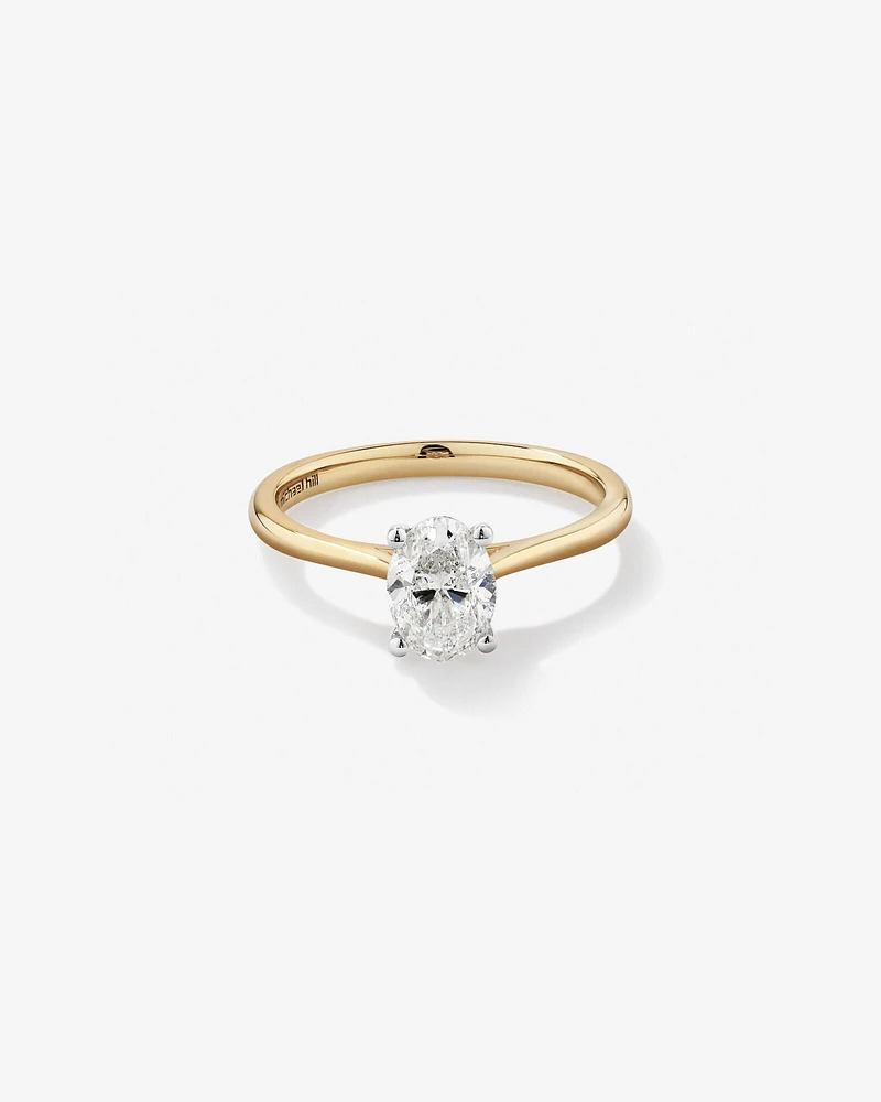 1.00 Carat TW Oval Solitaire Engagement Ring in 14kt Yellow and White Gold