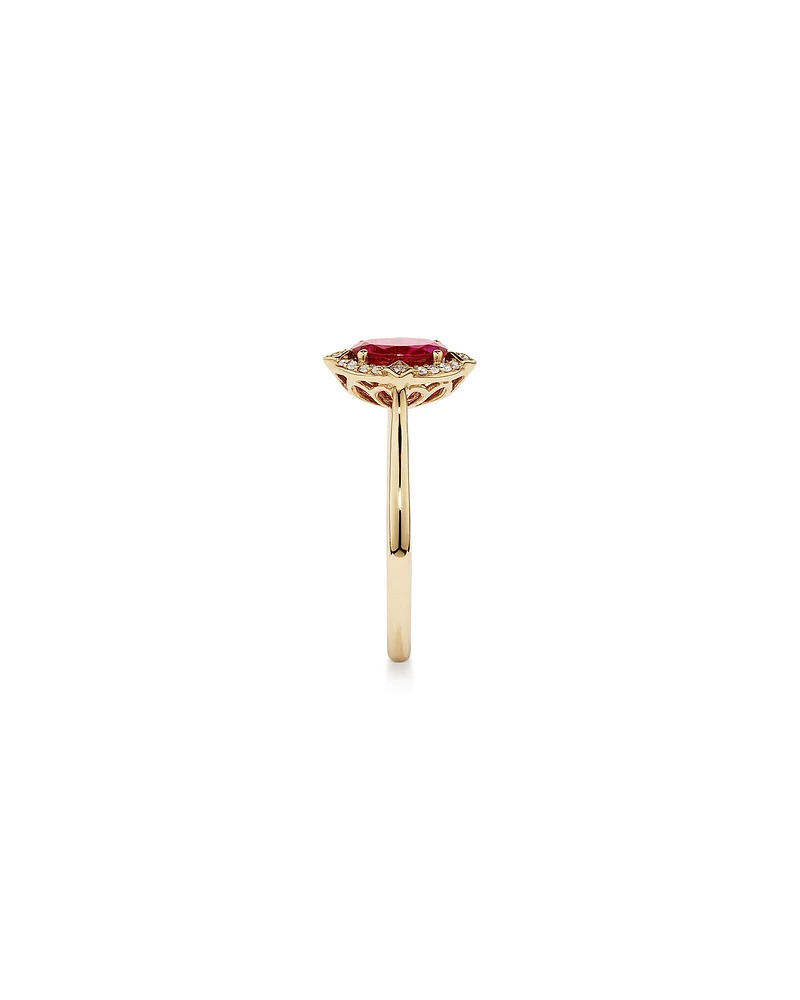 Oval Cut Created Ruby and Diamond Halo Ring in 10kt Yellow Gold