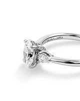 1.10 Carat TW Oval & Pear Cut Three Stone Engagement Ring in 18kt White Gold