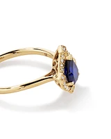 Pear Cut Created Sapphire and Diamond Halo Ring in 10kt Yellow Gold