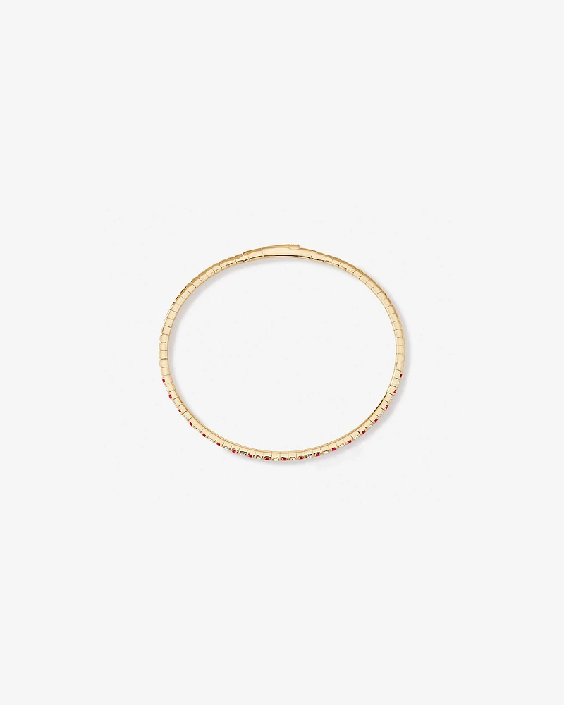 0.35 Carat TW Diamond and Pink Sapphire Gemstone Flex Oval Bangle in 10kt Yellow Gold