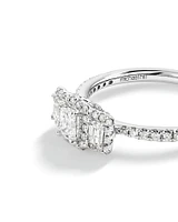 0.80 Carat TW Three Stone Emerald Cut Halo Engagement Ring in 14kt White Gold