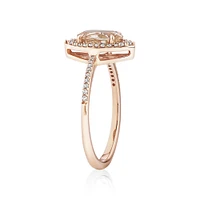 Halo Ring with Morganite & 0.20 Carat TW of Diamonds in 10kt Rose Gold