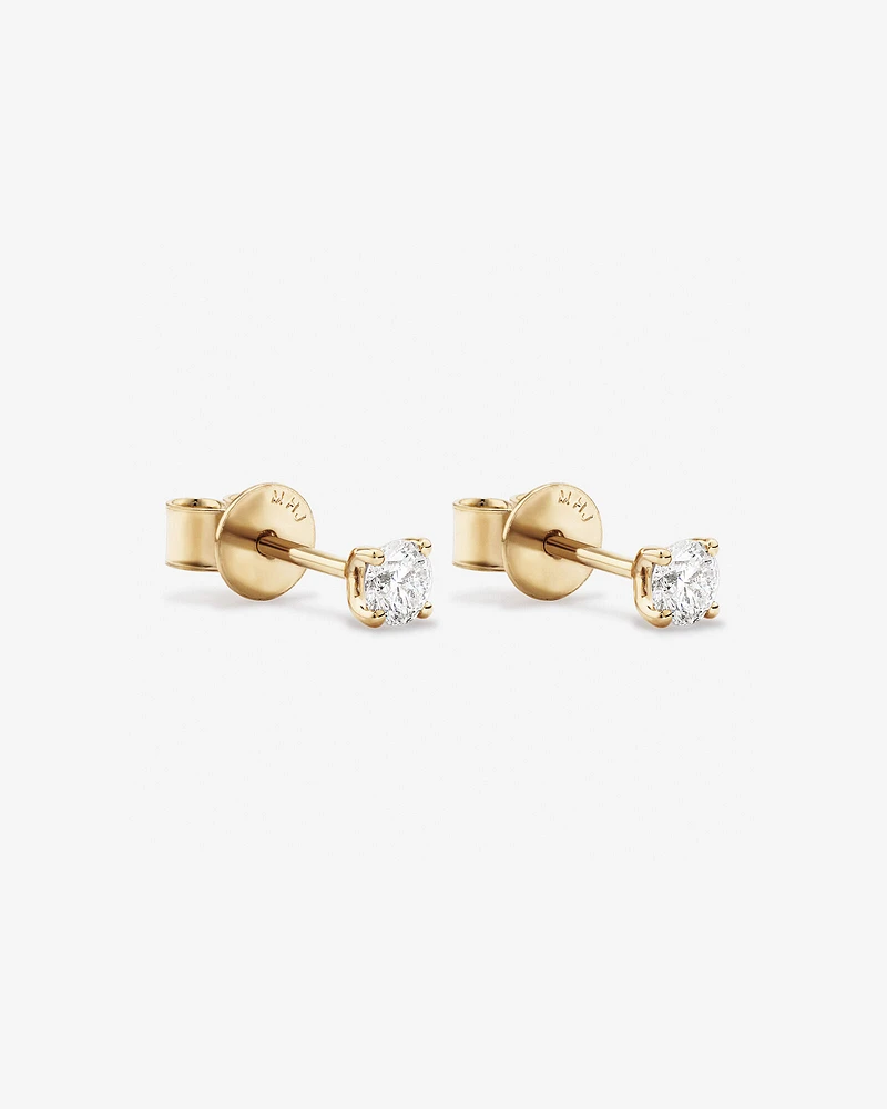 0,25 Carat TW Boucles d'oreilles puces solitaires en diamant en or blanc 18kt