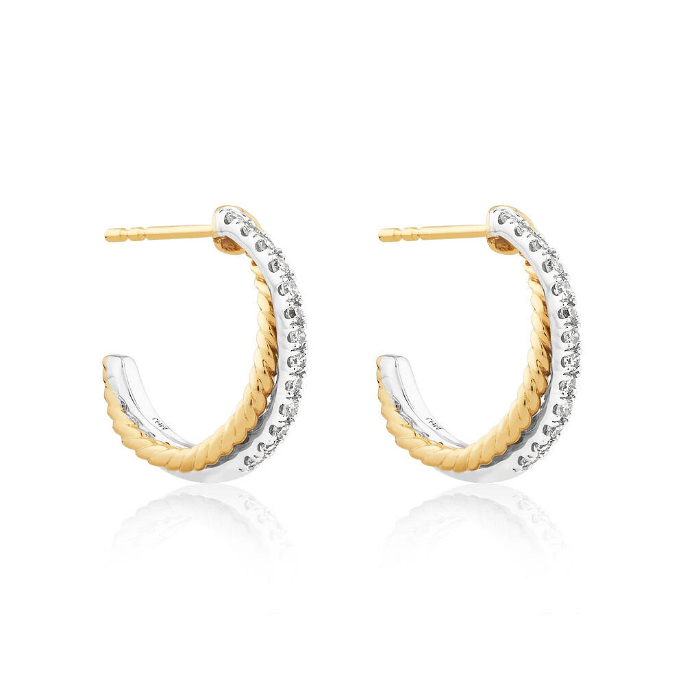 Crossover Hoop Earrings with .20 Carat TW Diamonds in Sterling Silver and 10kt Yellow gold