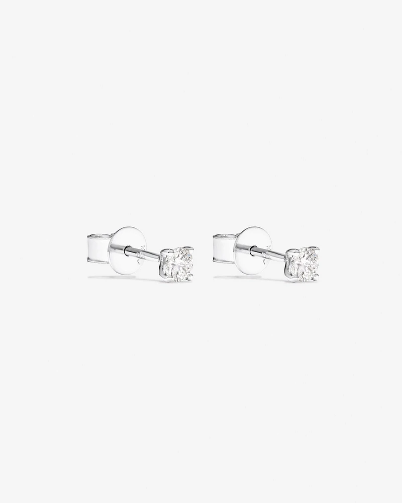 0,25 Carat TW Boucles d'oreilles puces solitaires en diamant en or blanc 18kt