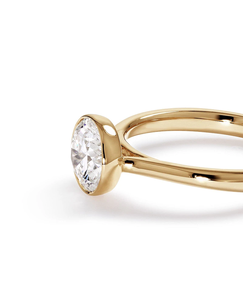 1.25 Carat TW Round Brilliant Laboratory-Grown Diamond Solitaire Bezel Set Engagement Ring in 14kt Yellow Gold