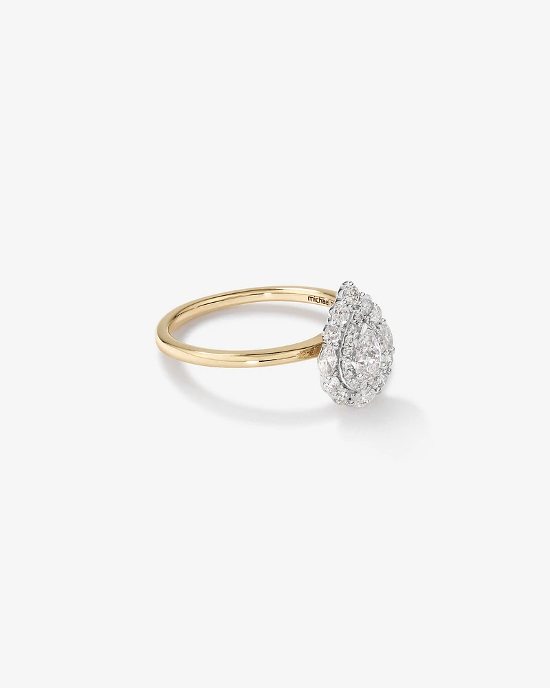 0.67 Carat TW Pear Cut Diamond Marquise and Round Brilliant Halo Engagement Ring in 14kt Yellow and White Gold