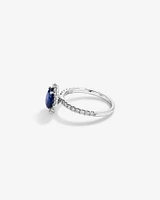 Bague Halo en Pierre Précieuse Saphir Bleu Taille Ovale et 0,60 Carat TW Diamant en Or Blanc 14 kt