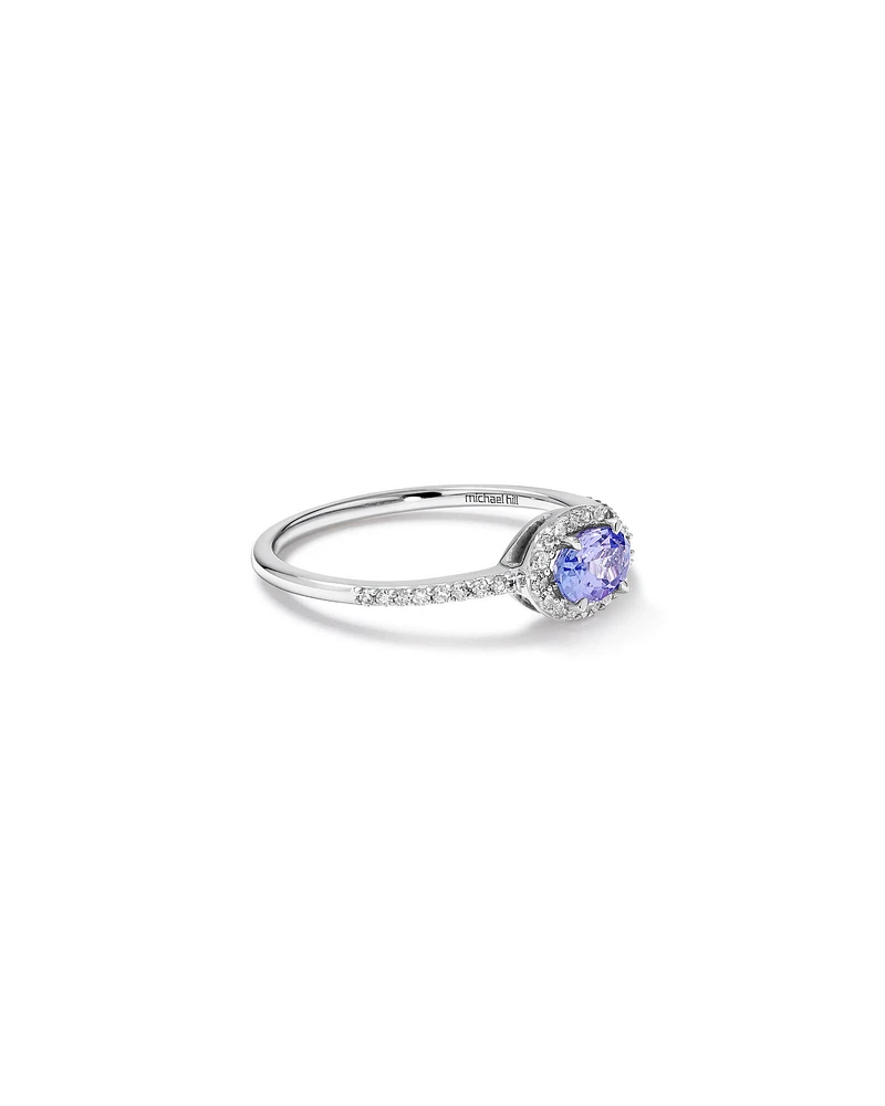 Halo Ring with Tanzanite & 0.15 Carat TW Of Diamonds in 10kt White Gold