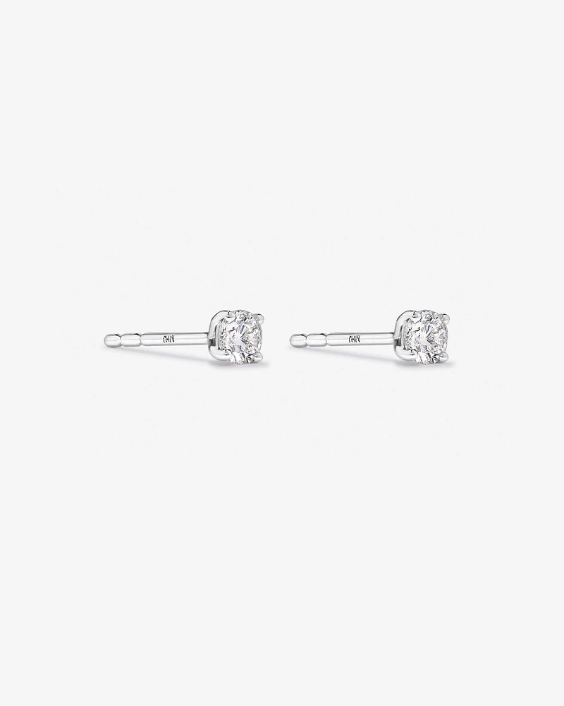 0,25 Carat TW Boucles d'oreilles puces solitaires en or blanc 18kt