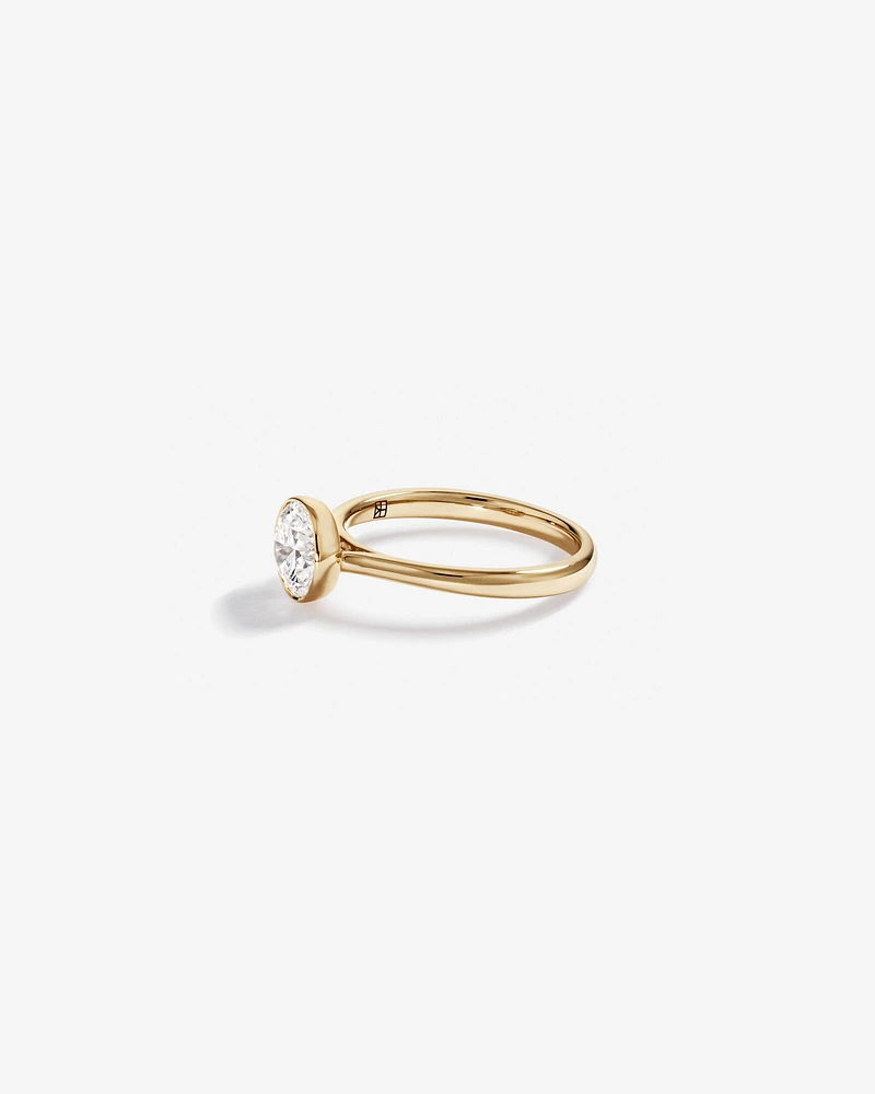 1.25 Carat TW Round Brilliant Laboratory-Grown Diamond Solitaire Bezel Set Engagement Ring in 14kt Yellow Gold