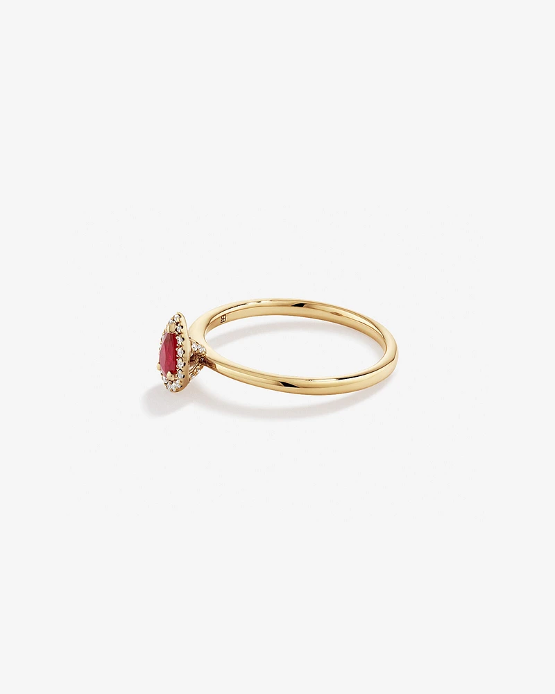 Pear Cut Red Ruby Gemstone and 0.08 Carat TW Diamond Halo Ring in 10kt Yellow Gold