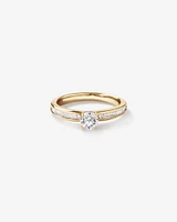 0.77 Carat TW Round Brilliant Diamond and Baguette, Princess Side Accent Engagement Ring with Hidden Halo in 14kt Yellow Gold