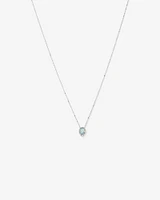 Oval Cut Blue Aquamarine Gemstone and 0.19 Carat TW Diamond Halo Pendant Necklace in 10kt White Gold