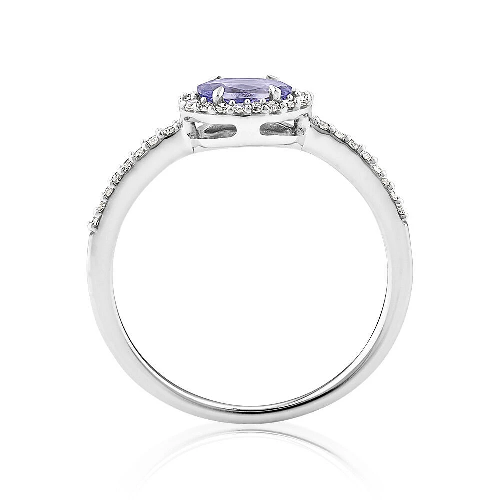 Halo Ring with Tanzanite & 0.15 Carat TW Of Diamonds in 10kt White Gold