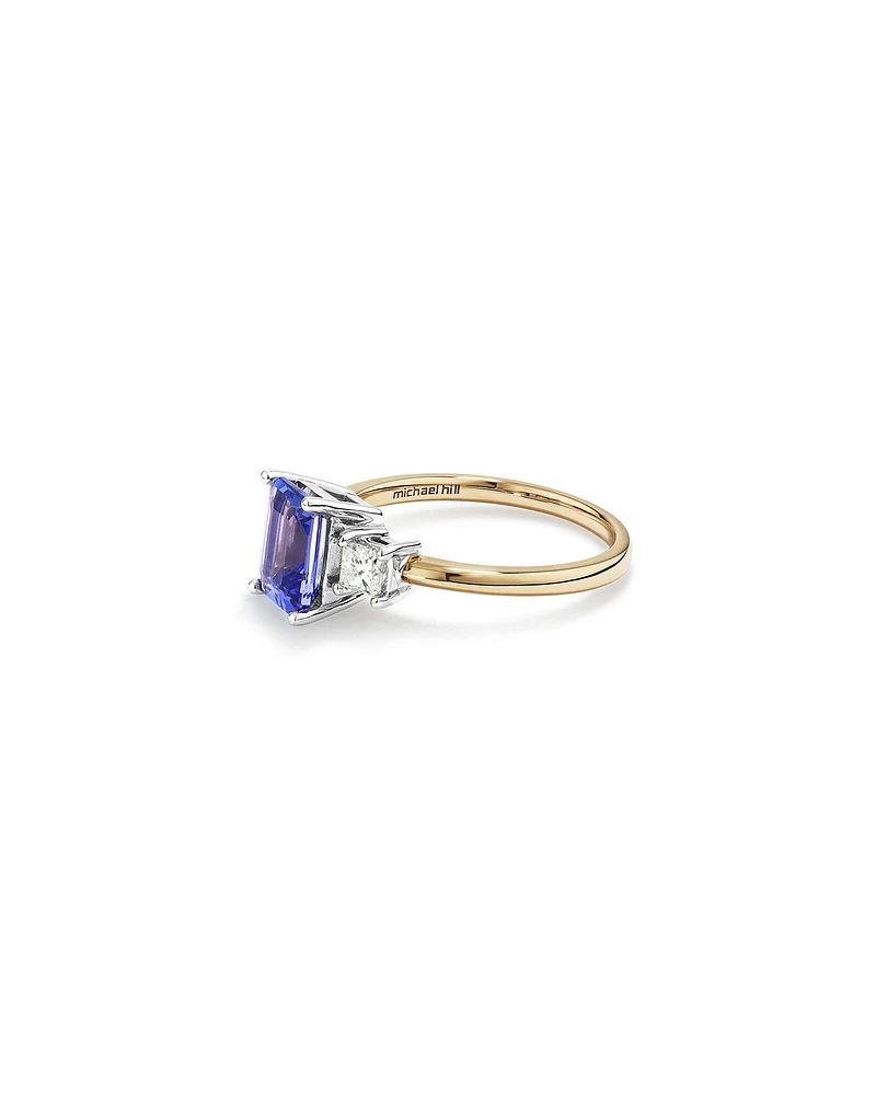 Bague en or blanc et jaune 10 K avec tanzanite et diamants totalisant 0,40 ct