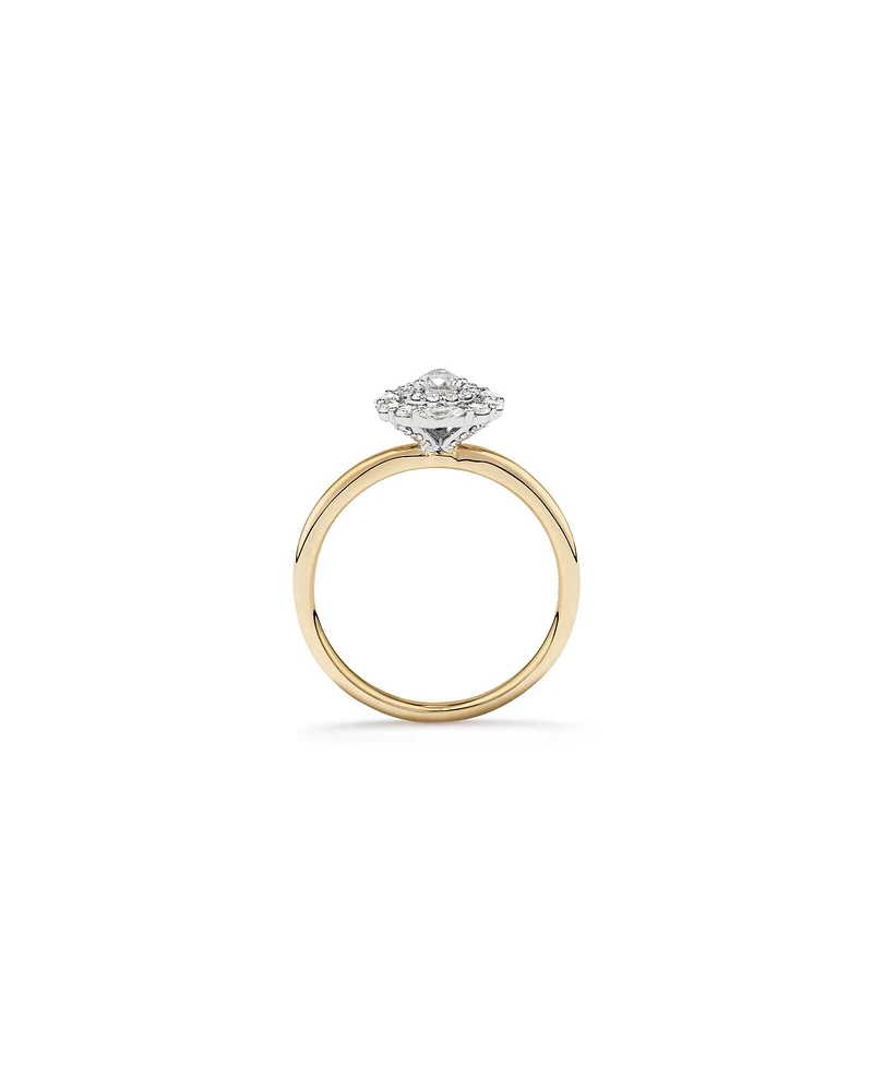 0.67 Carat TW Pear Cut Diamond Marquise and Round Brilliant Halo Engagement Ring in 14kt Yellow and White Gold