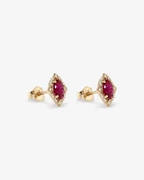 Oval Cut Created Ruby and Diamond Halo Stud Earrings in 10kt Yellow Gold