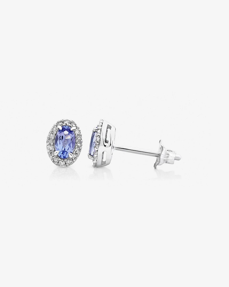 Halo Stud Earrings with Tanzanite & 0.12 Carat TW Of Diamonds in 10kt White Gold