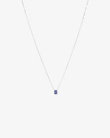 Emerald Cut Blue Tanzanite and 0.17 Carat TW Diamond Halo Pendant in 14kt White Gold