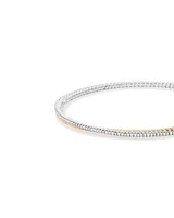 Double twist bangle with .32 Carat TW Diamonds in Sterling Silver and 10kt Yellow Gold