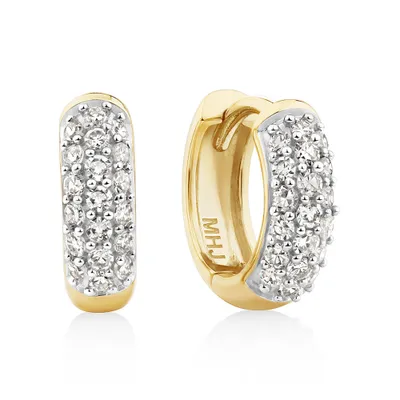Petits anneaux en or jaune 10 K à diamants totalisant 0,25 ct