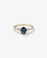 Ring with Blue Topaz and 0.12 Carat TW of Diamonds in 10kt Yellow Gold