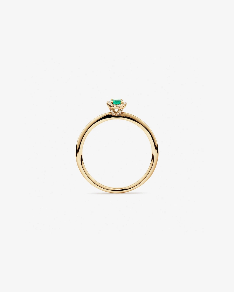 Oval Cut Green Emerald Gemstone and 0.08 Carat TW Diamond Halo Ring in 10kt Yellow Gold