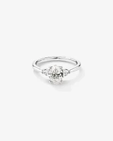 1.10 Carat TW Oval & Pear Cut Three Stone Engagement Ring in 18kt White Gold