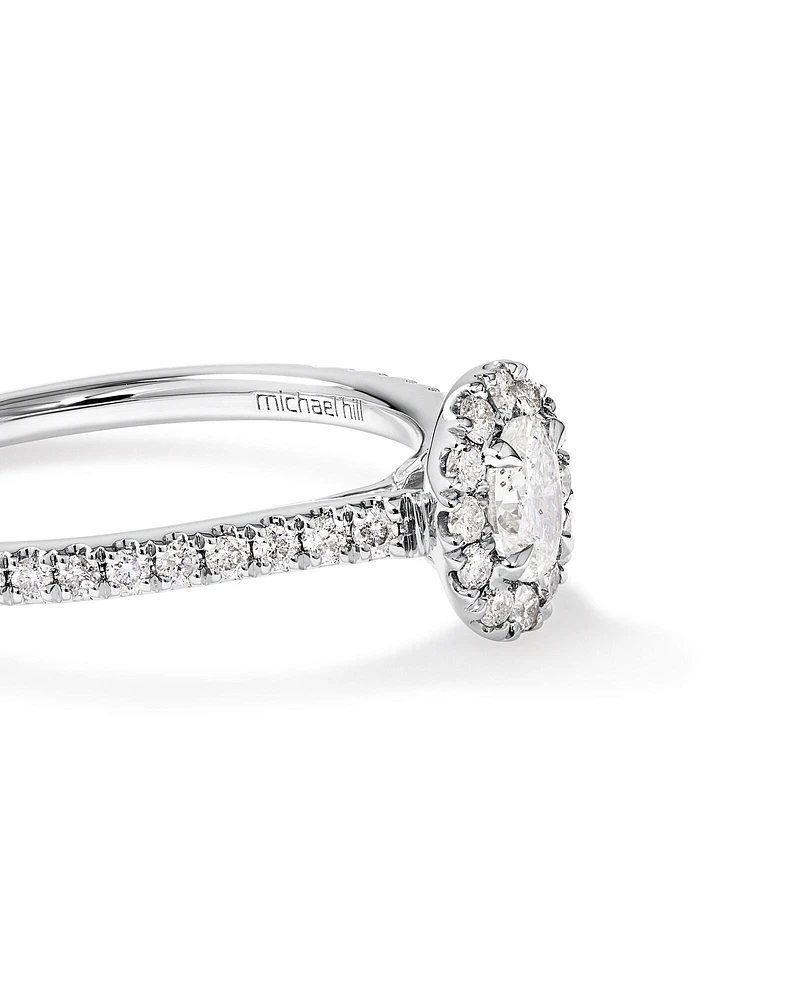 Oval Halo Ring with 0.50 Carat TW of Diamonds in 14kt White Gold