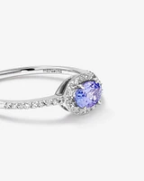 Halo Ring with Tanzanite & 0.15 Carat TW Of Diamonds in 10kt White Gold