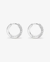 Cubic Zirconia Puff Cross Huggie Earrings in Sterling Silver