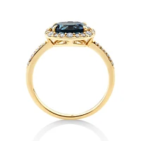 Halo Ring with London Blue Topaz & 0.25 Carat TW of Diamonds in 10kt Yellow Gold