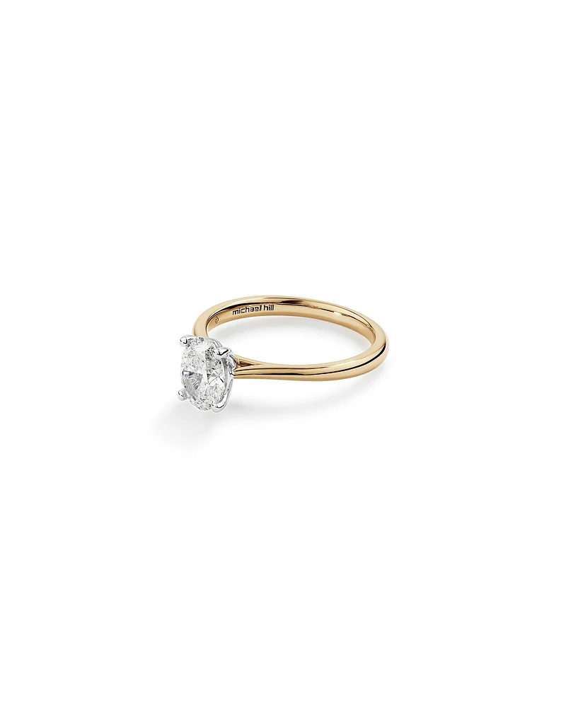 1.00 Carat TW Oval Solitaire Engagement Ring in 14kt Yellow and White Gold