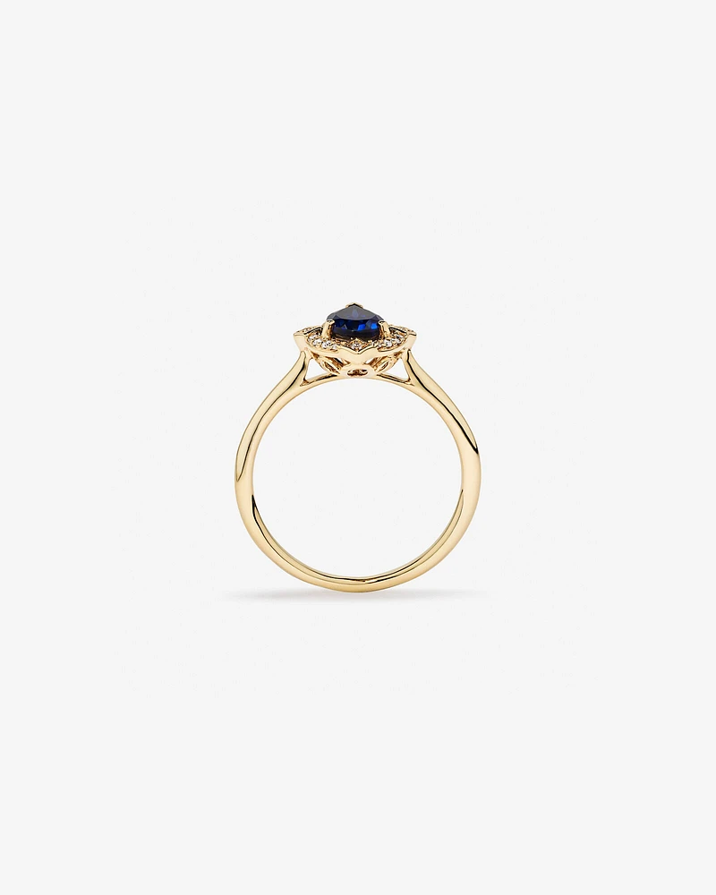 Pear Cut Created Sapphire and Diamond Halo Ring in 10kt Yellow Gold