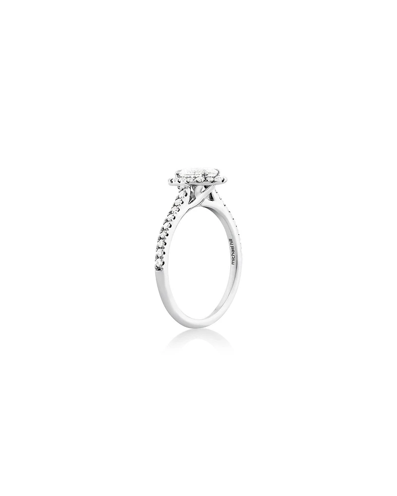 Halo Oval Engagement Ring with 0.92 Carat TW of Diamonds in 14kt White Gold