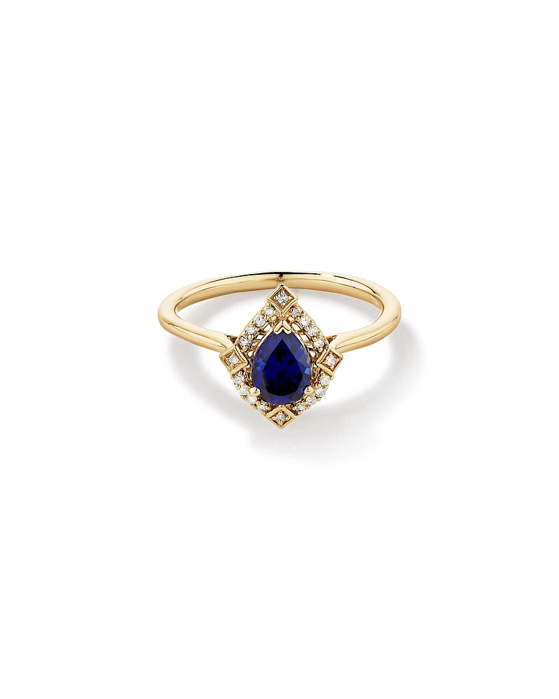 Pear Cut Created Sapphire and Diamond Halo Ring in 10kt Yellow Gold