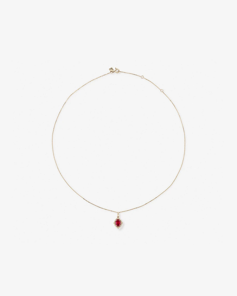 Oval Cut Created Ruby and Diamond Halo Pendant Necklace in 10kt Yellow Gold