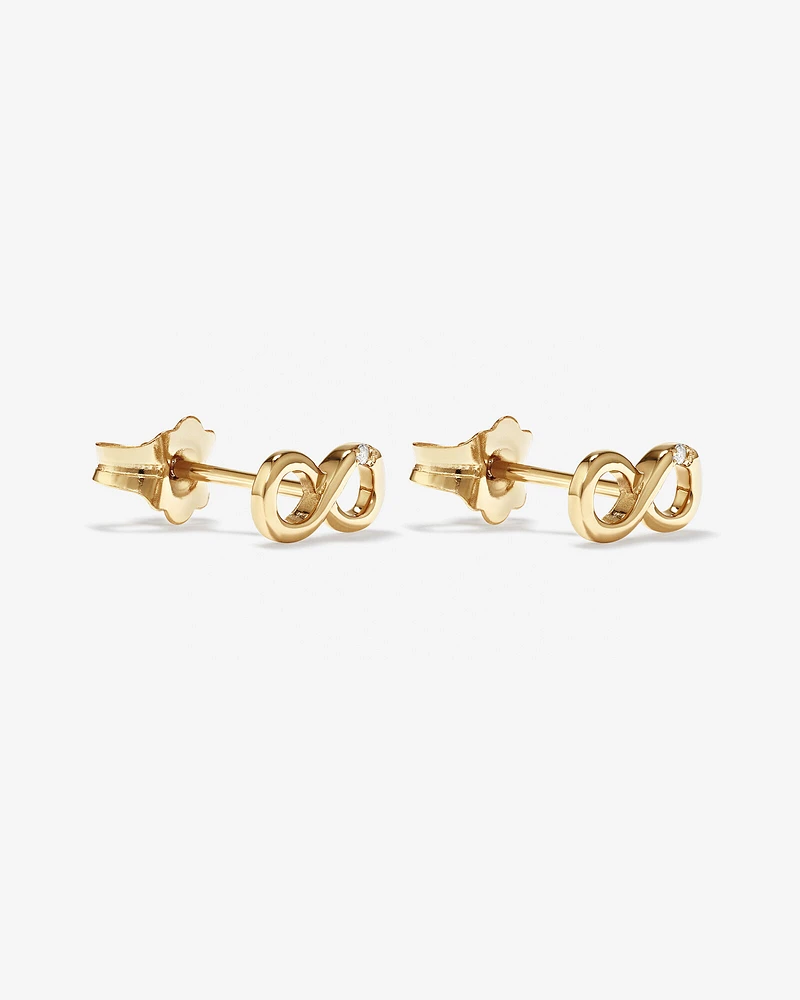 Boucles d'oreilles à tige infini ornées d'un diamant en or jaune 10kt