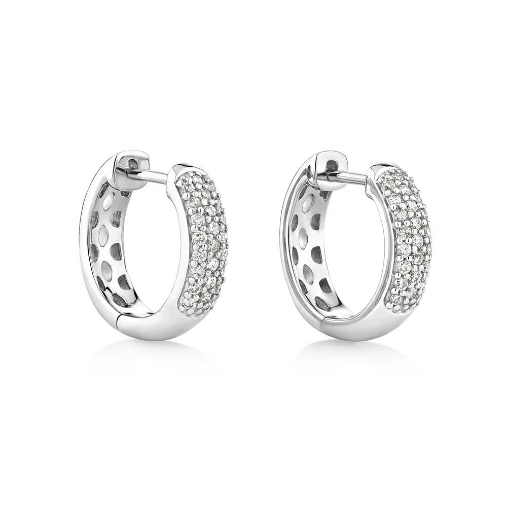 Huggie Earrings With 1/4 Carat TW Of Diamonds In 10kt White Gold