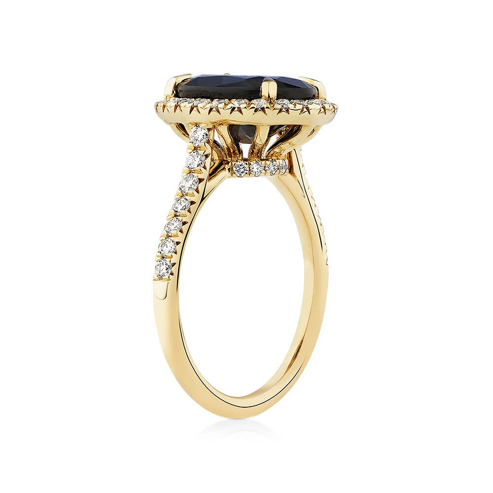 Halo Ring with Sapphire & 0.62 Carat TW of Diamonds in 14kt Yellow Gold