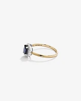 Oval Cut Blue Sapphire Gemstone and 0.10 Carat TW Diamond Halo Engagement Ring in 10kt Yellow and White Gold